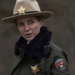 Annabelle Wallis as a police officer looking annoyed in the movie The Silencing
