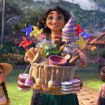 Mirabelle holds a basket full of pinwheels and other things in the Disney movie Encanto